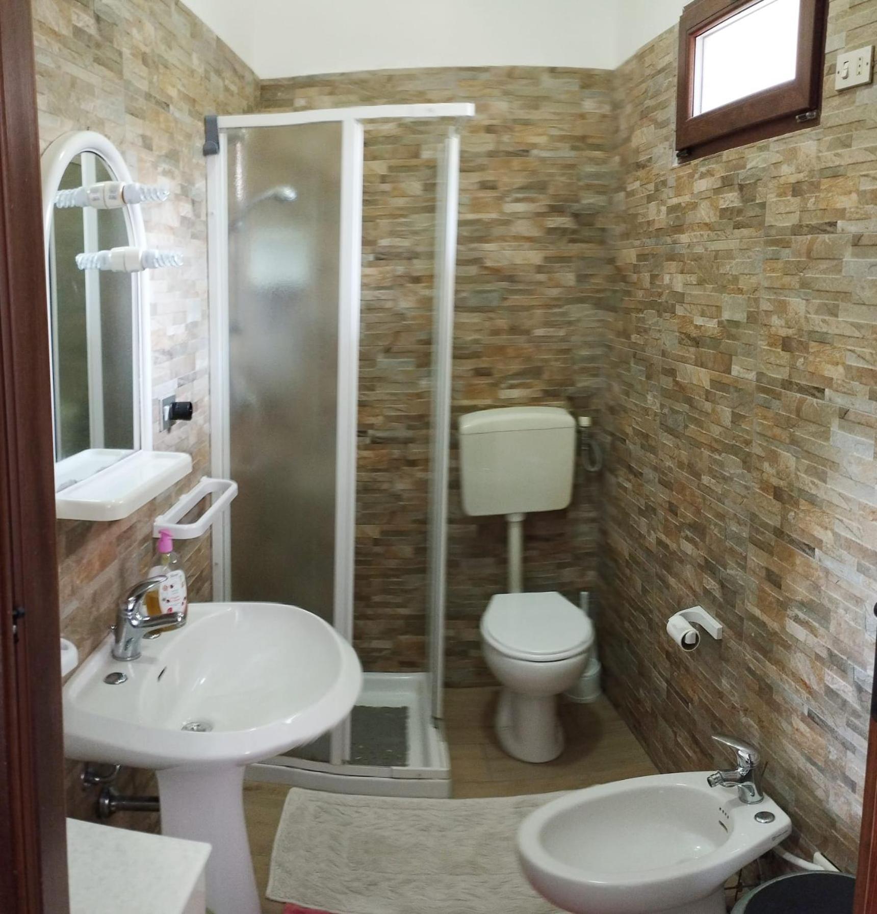 Casa Vacanze"Il Bouganville" 卡尔博尼亚 外观 照片