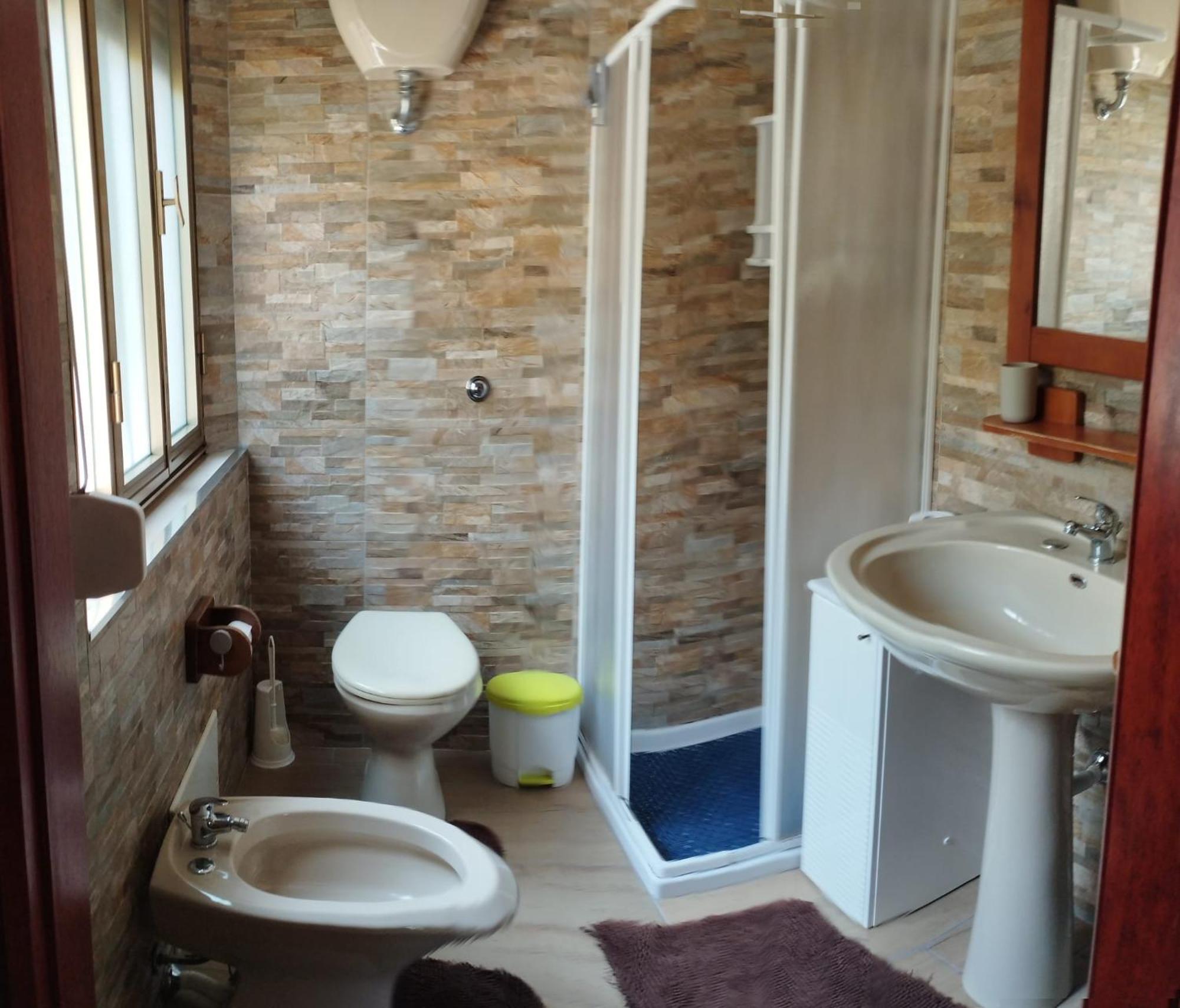 Casa Vacanze"Il Bouganville" 卡尔博尼亚 外观 照片